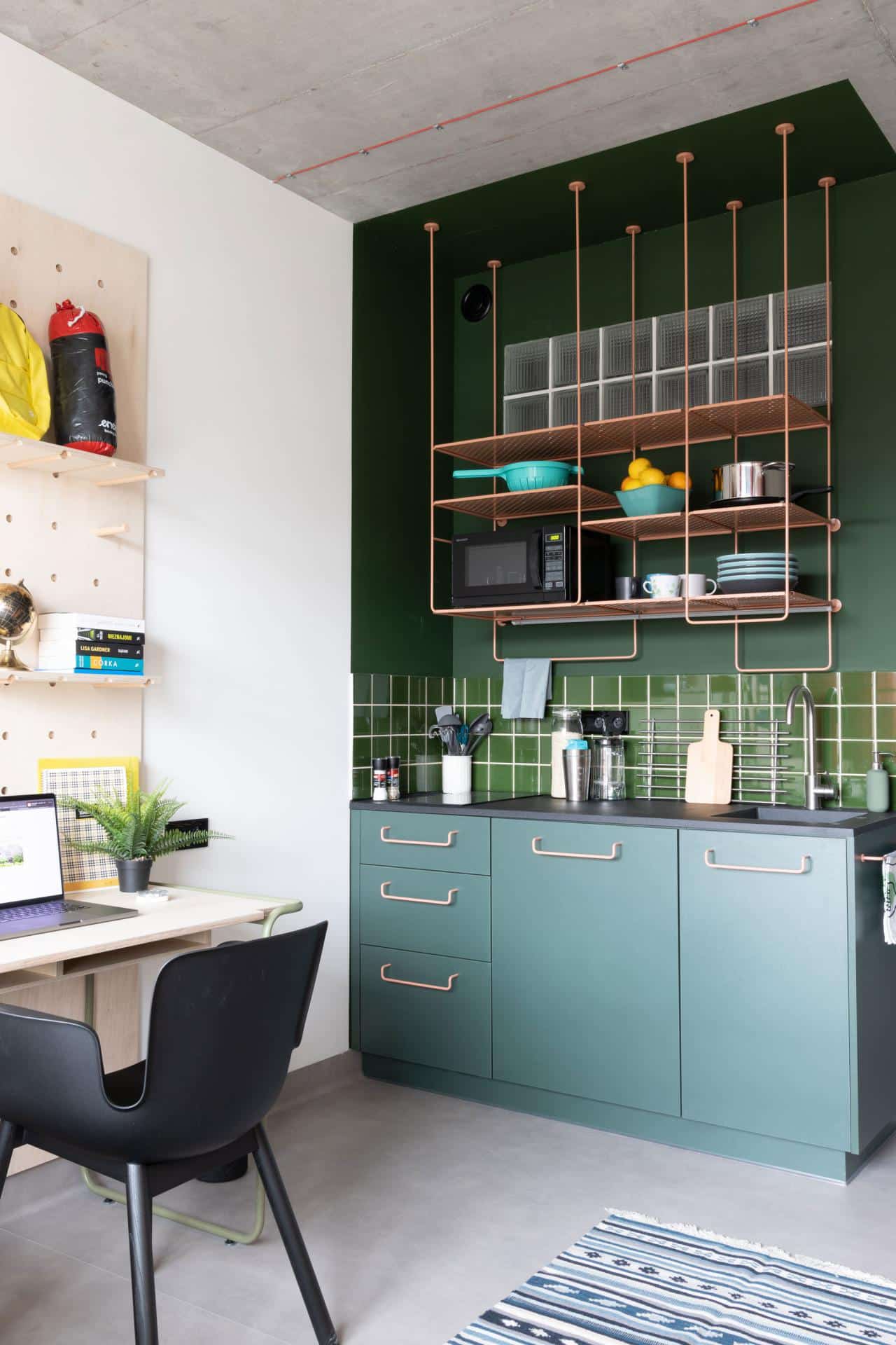 Cooking area in a studio room at Basecamp Katowice student housing