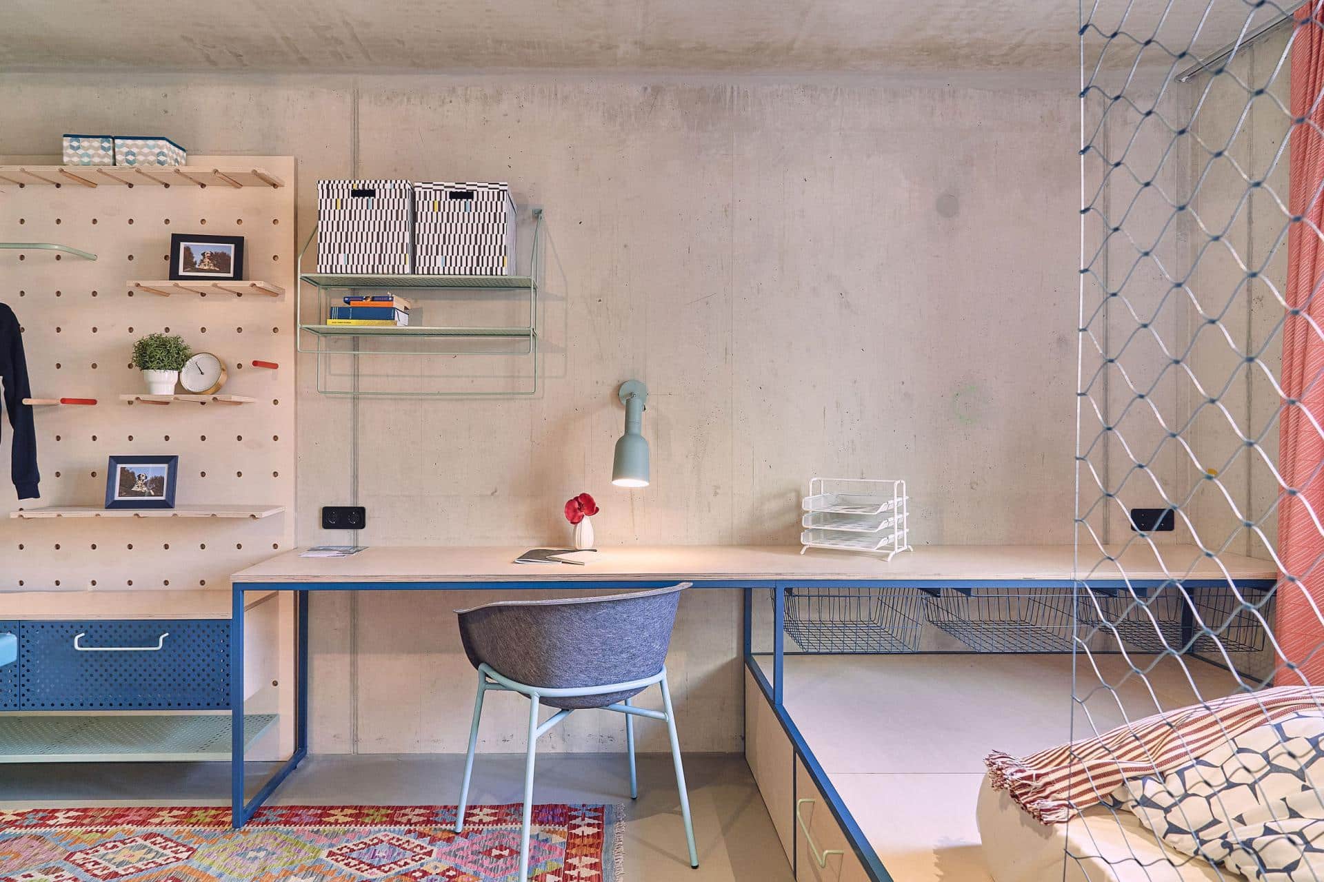 Single rooms' bed and working space