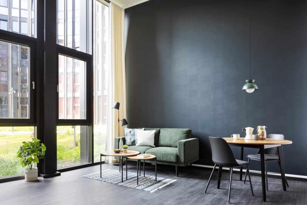 Dining area of a large studio room in Basecamp Lyngby student accommodation