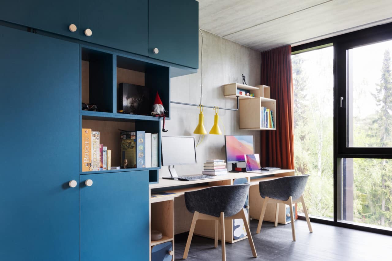 Study area with a large window in a student room in Basecamp Lyngby student dorm