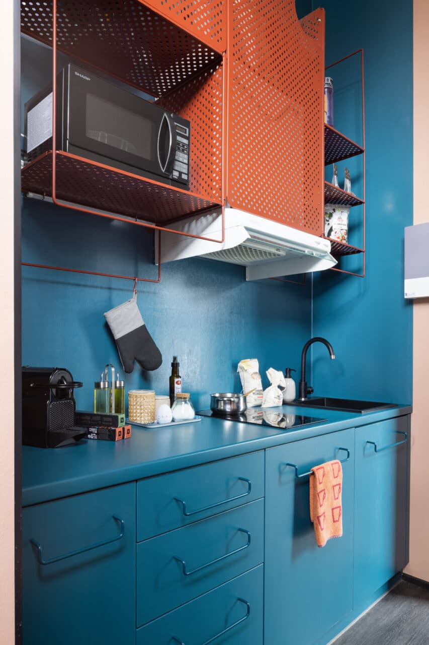 kitchenette and sink in the private kitchen of a student room in Basecamp Copenhagen dorm