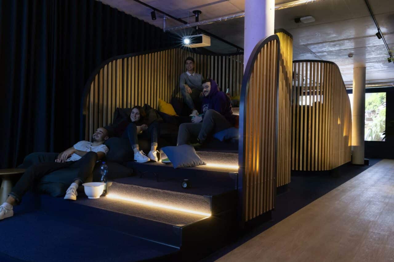 students watching a movie in the cinema room at Basecamp Dormtund dormitory