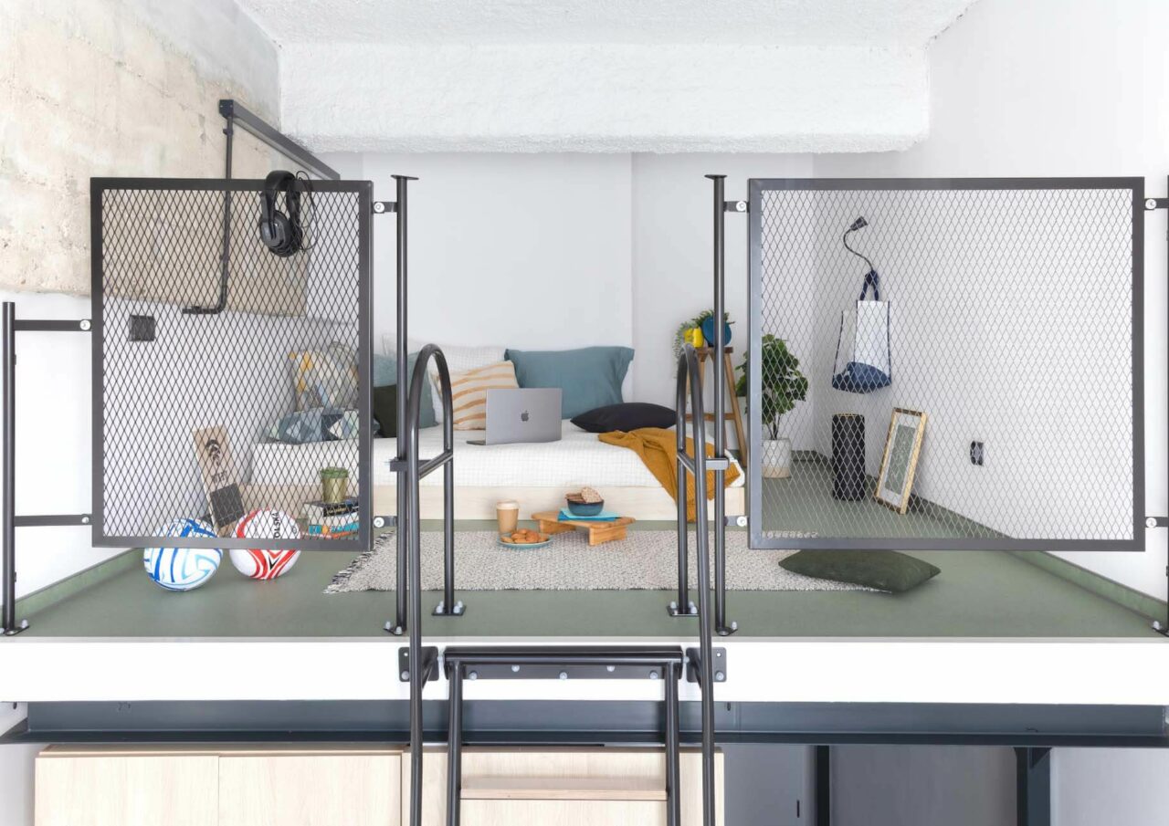 Large bed in one of the mezzanine rooms at Basecamp Copenhagen student housing