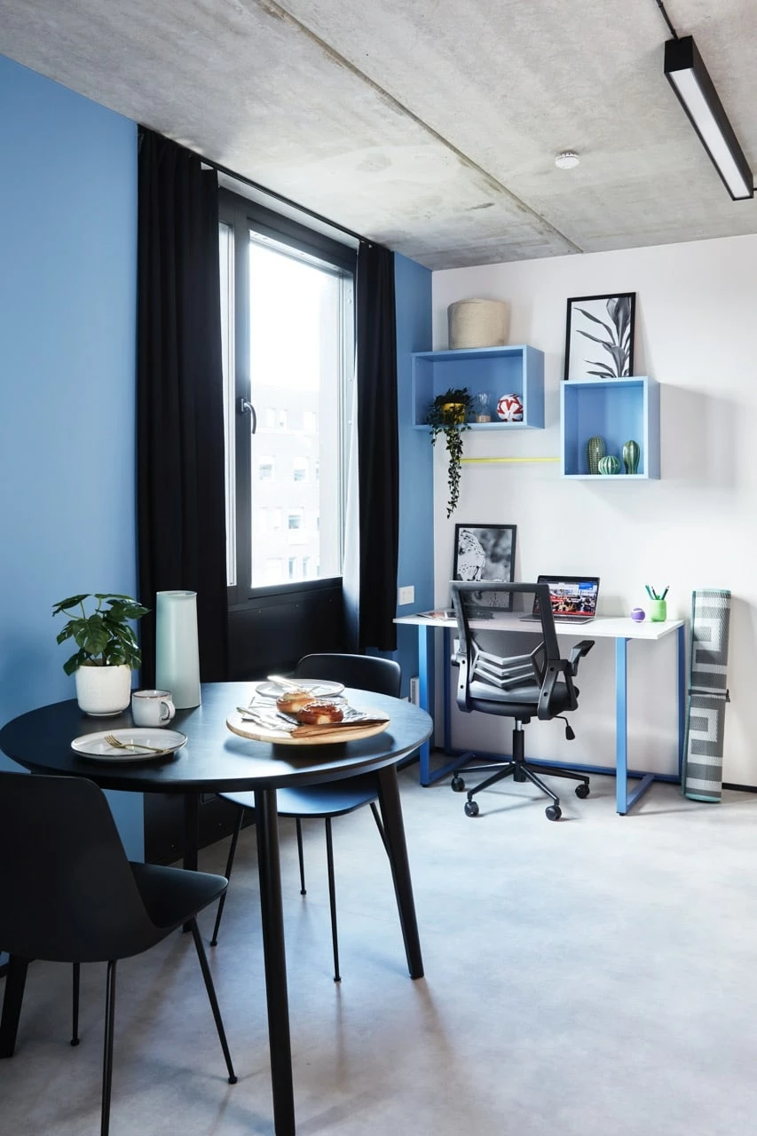 dining and study area of a studio room at Basecamp Malmö student accommodation