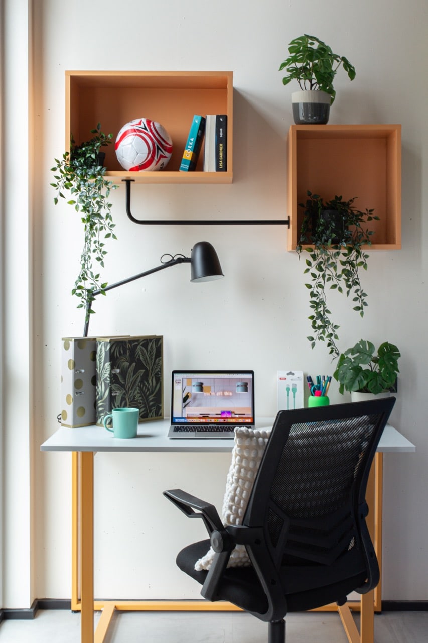 Study area with storage, desk and chair in a single room at Basecamp aarhus student housing