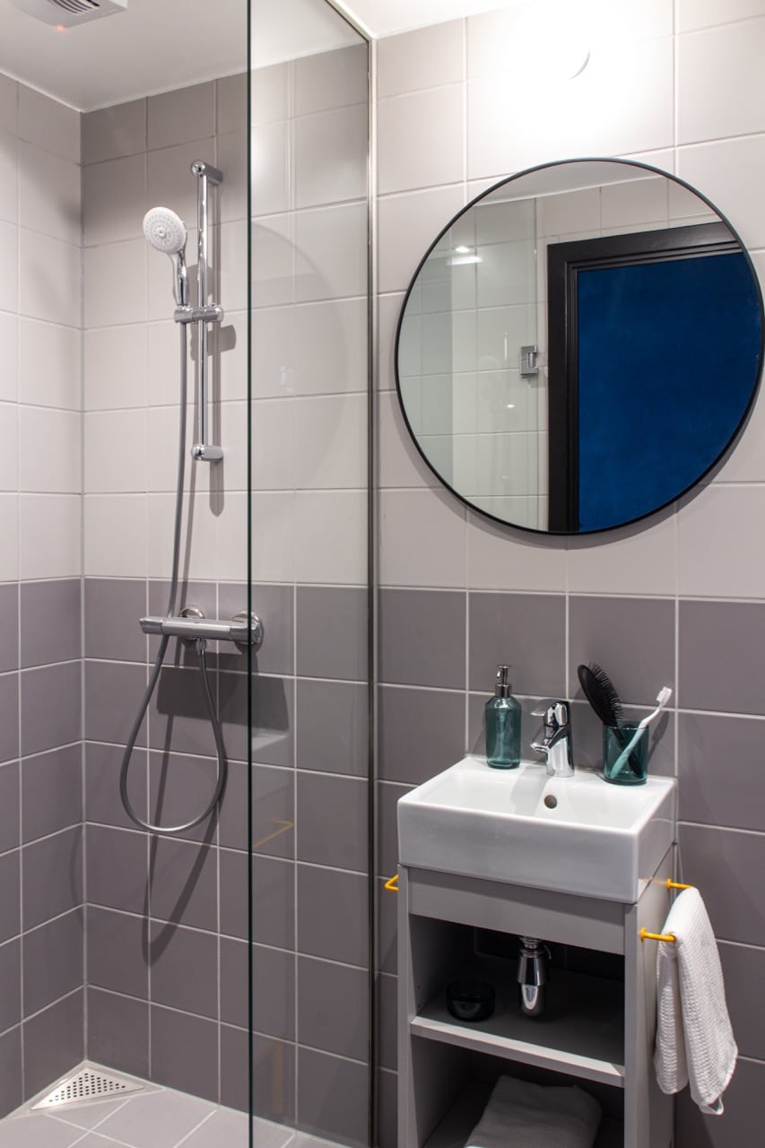 Shower and sink in the private bathroom of a student room in Basecamp Aarhus