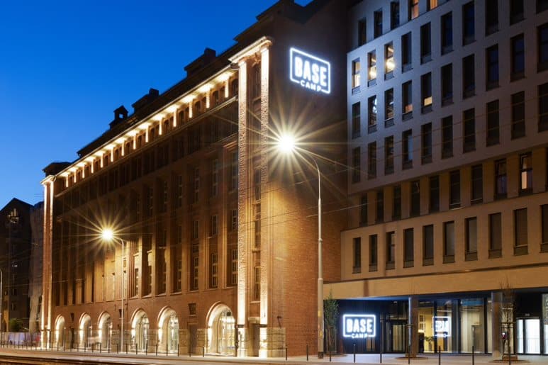 Exterior view of Basecamp Wroclaw dormitory at night