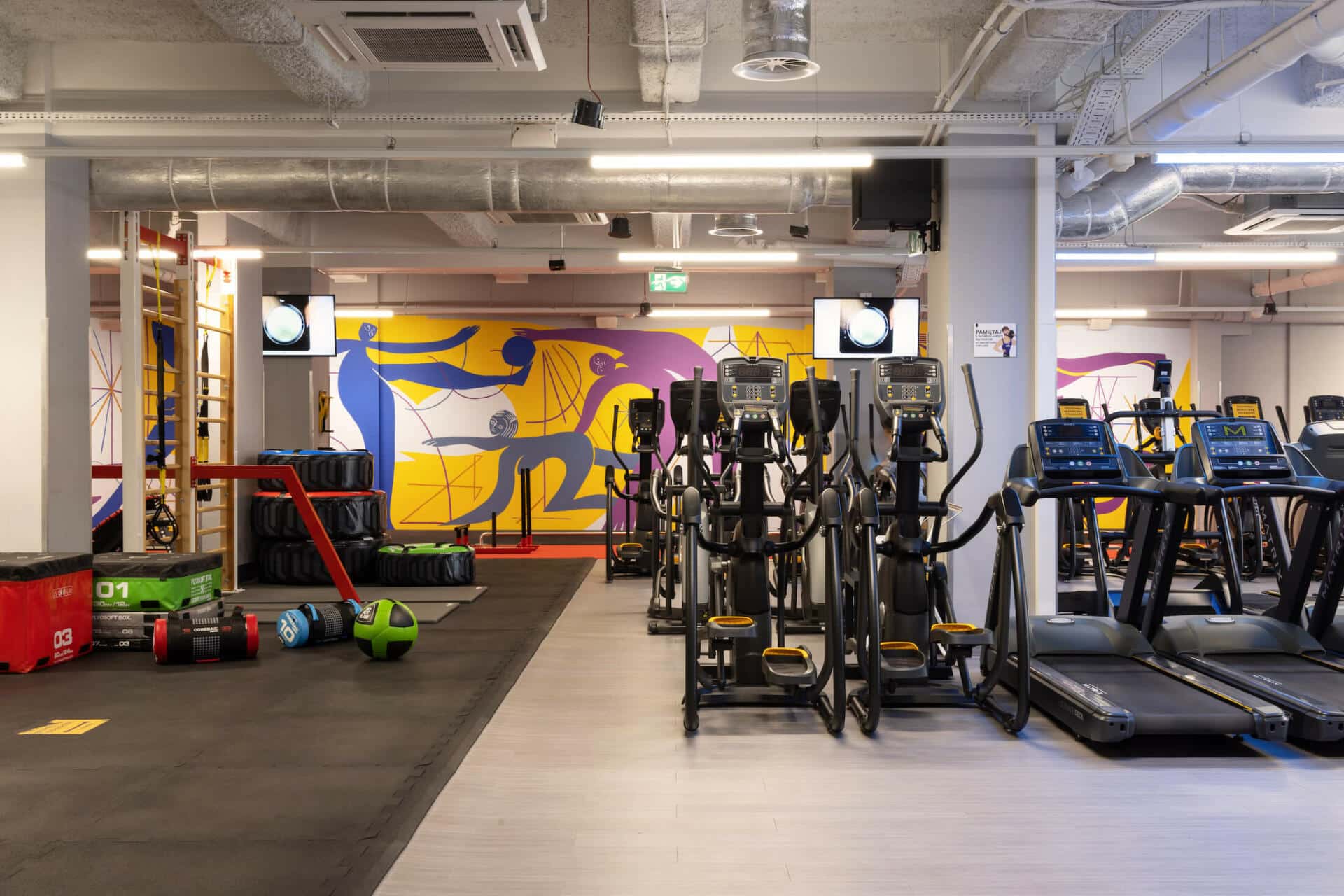 running machines and cross trainers in the gym at Basecamp Łódź Rewolucji student accommodation