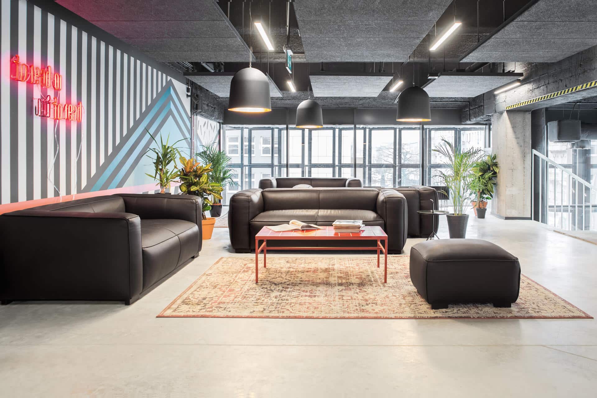 Lounge area with sofas at Basecamp Łódź Rewolucji student dorm