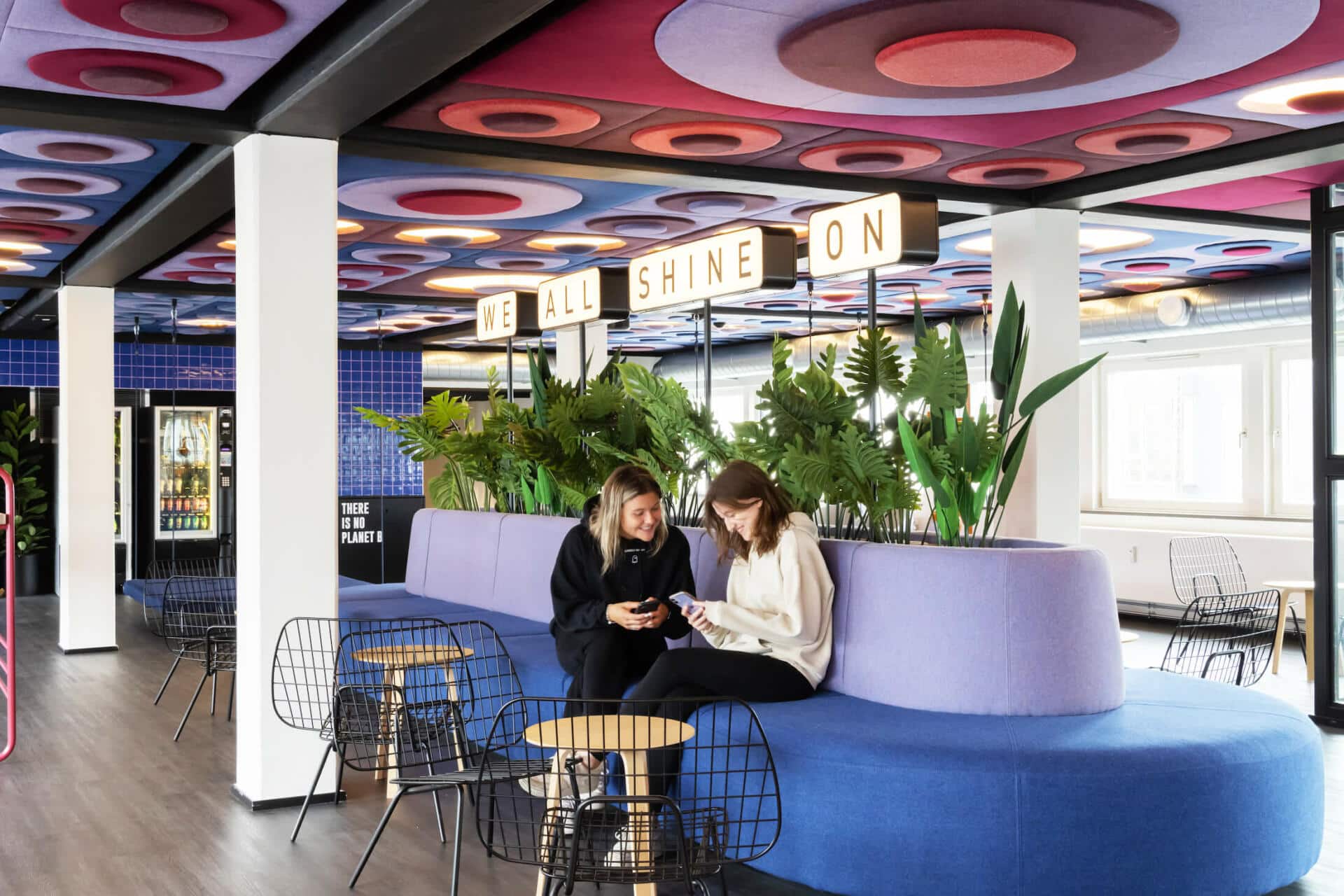 Two students chatting in a Relax Area at Basecamp Copenhagen dormitory