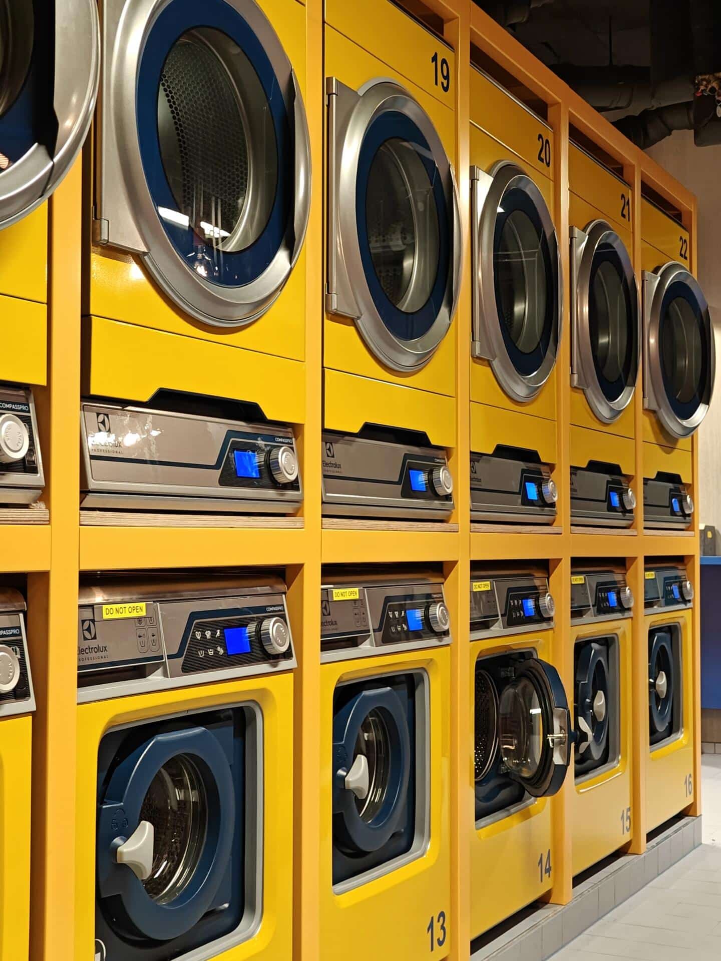 Washing machines and tumble dryers in the laundry facilities at Basecamp Malmö student accommodation