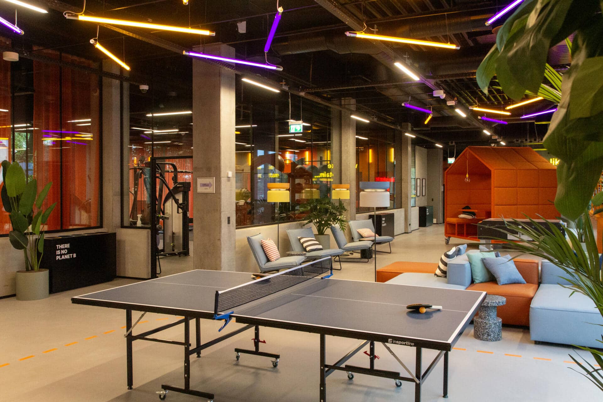 Basecamp Aarhus student accommodation gaming zone with seating area and table tennis table