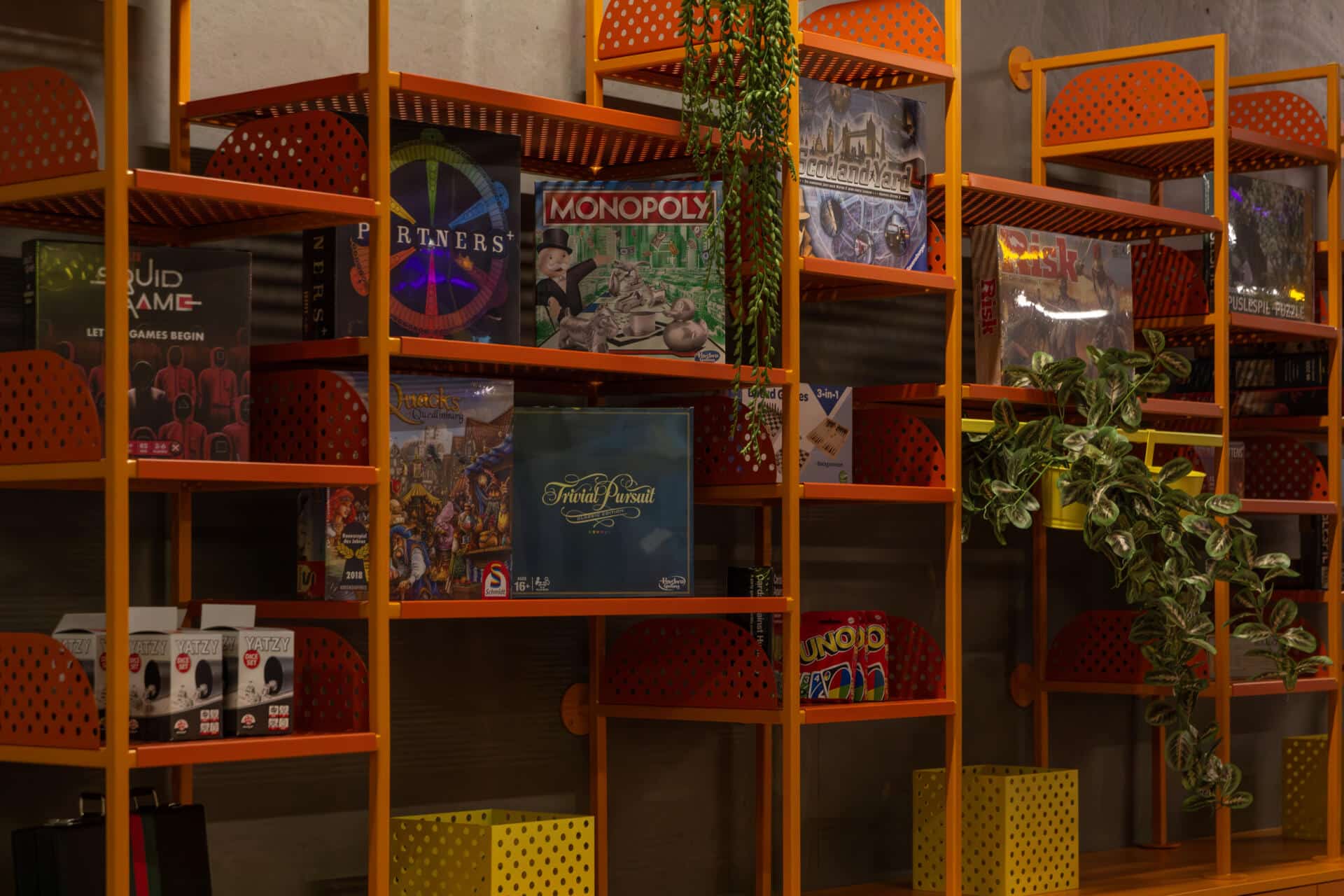 shelves full of board games in the game zone at Basecamp Aarhus student accommodation
