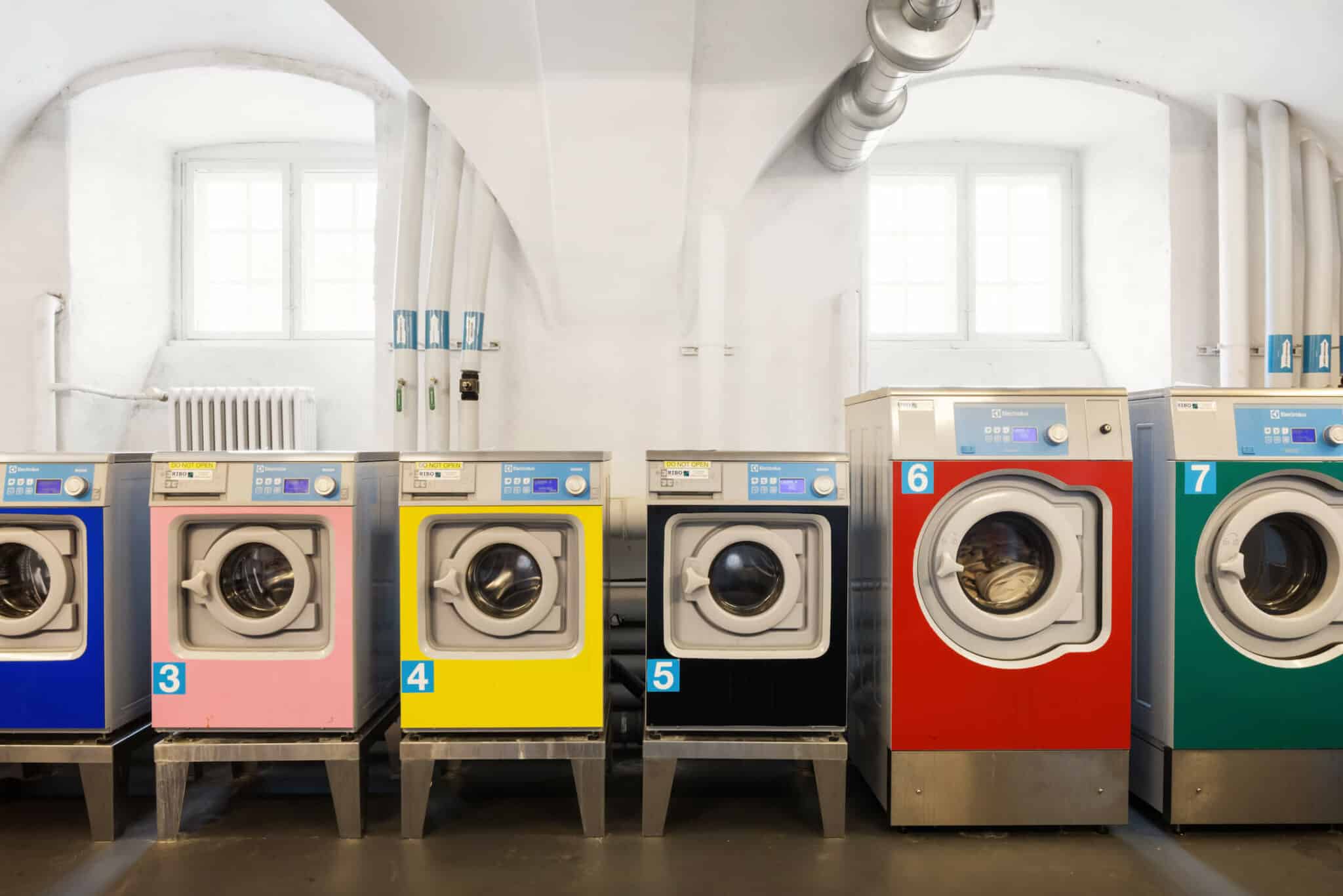 Colourful aundry machines at Basecamp Copenhagen student accommodation