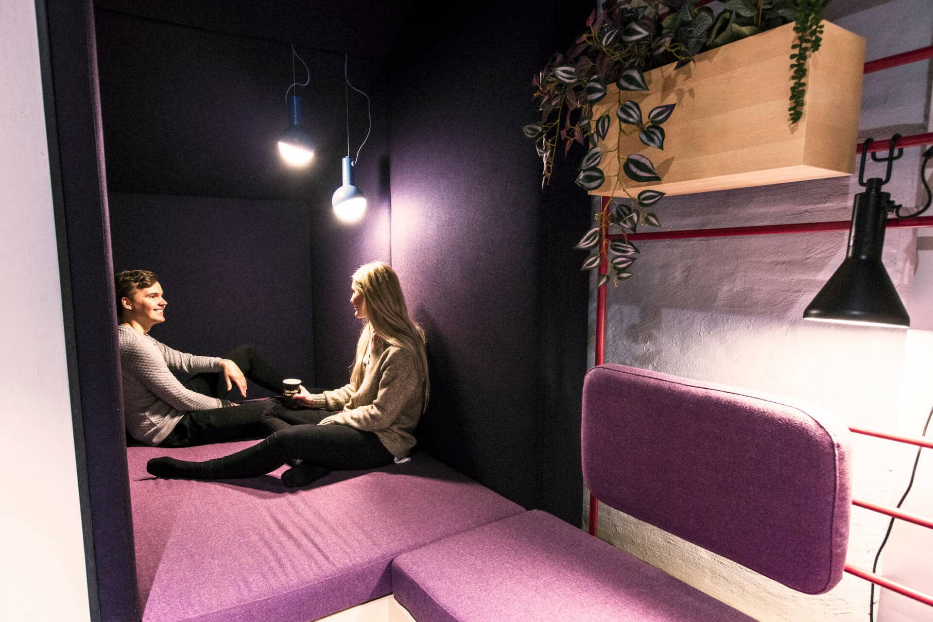 Students hang out in the Relax Area at Basecamp student accommodation in Copenhagen South Campus