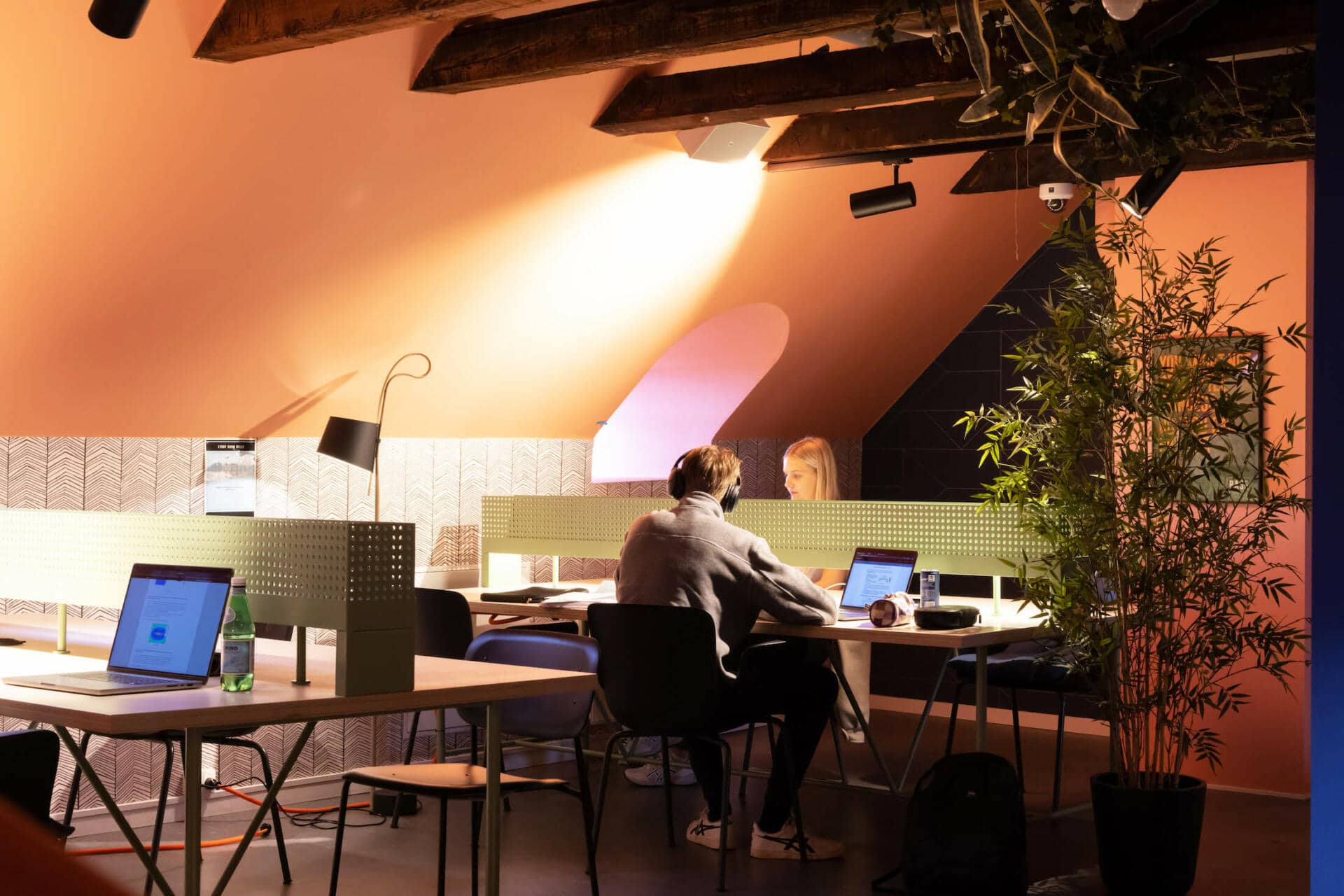 Student residents studying in one the study spaces at Basecamp Copenhagen student housing