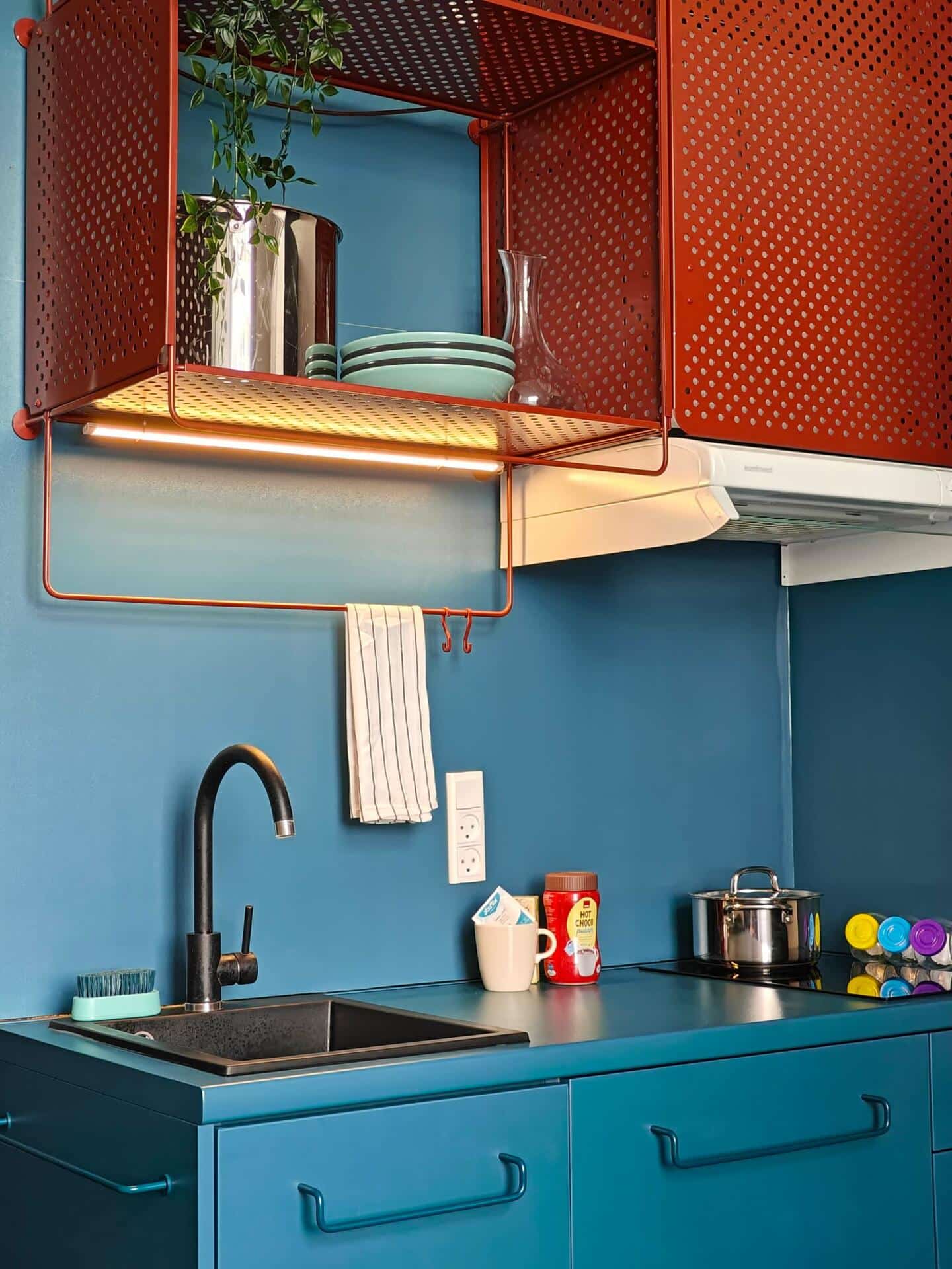 Blue kitchenette at Basecamp Copenhagen dorm