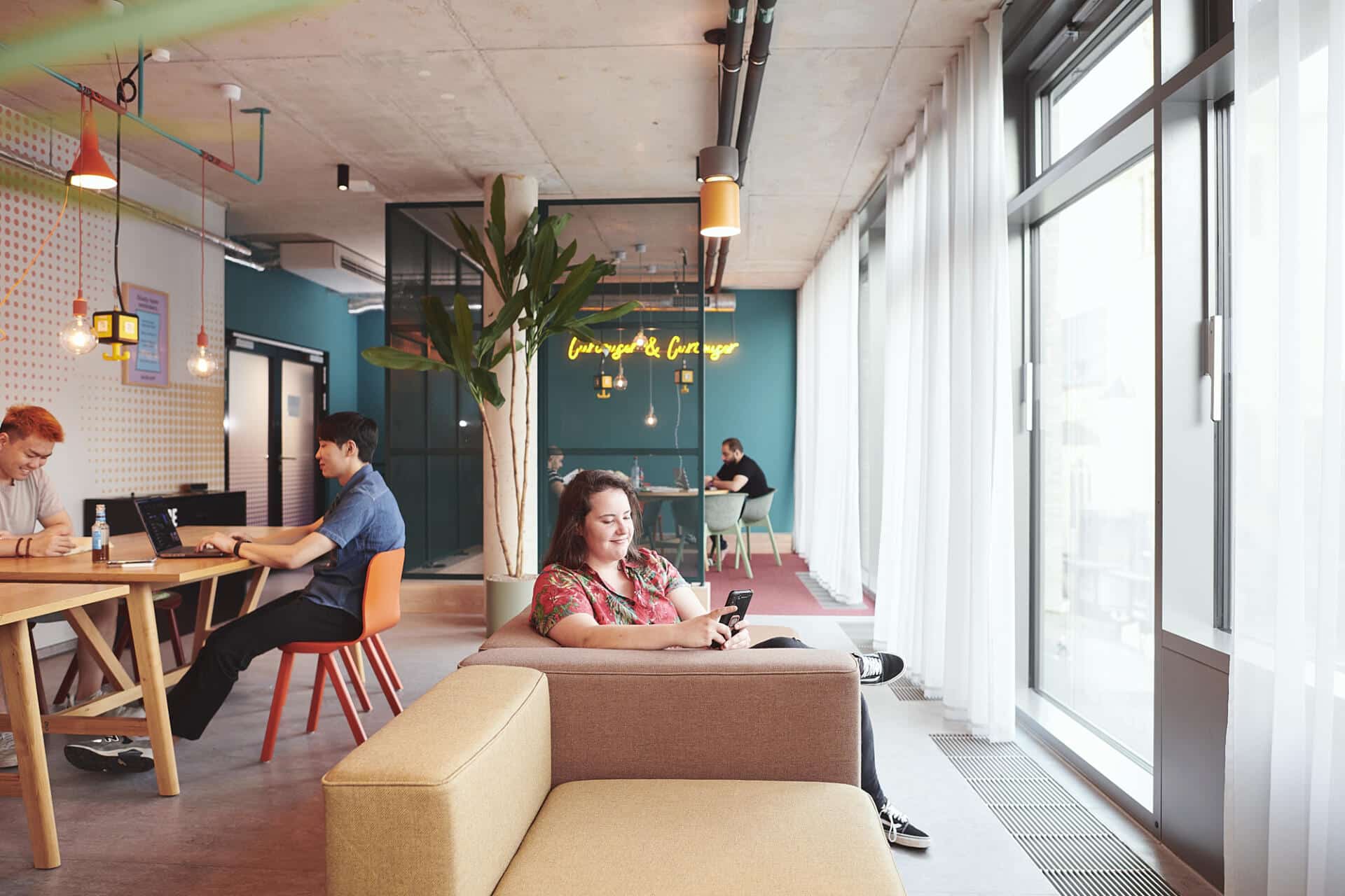 Guests enjoying the Quiet Study Space at Basecamp Dortmund Hotel